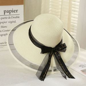 Chapeau de plage en paille à large bord pour femme, protection solaire tendance pour l'extérieur, vente en gros - Product Image 3