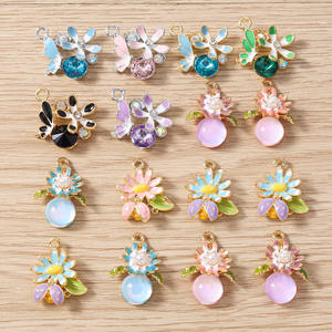 10 Piezas de Dijes de Flores y Mariposas de Esmalte, Colgante de Cristal con Forma de Margarita para Llaveros, Accesorios de Joyería, Suministros para Manualidades, Venta al por Mayor - Product Image 1