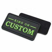 Badges en caoutchouc lumineux pour vêtements, vente en gros, logo personnalisé en relief 3D, patchs en PVC souple qui brillent dans le noir pour vêtements