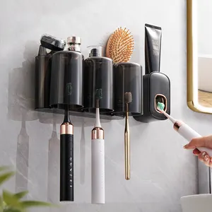 Hot Sales Factory Outlet Plastic Toothpaste Dispenser Smart Magnetic Toothbrush Holder Wall Mounted