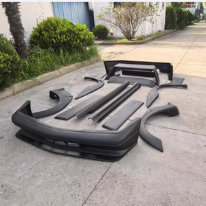 Kit de Carrocería Estilo <span class=keywords><strong>AMG</strong></span> para Mercedes-Benz Clase <span class=keywords><strong>E</strong></span> W124 4 Puertas (86-95) EVO 2 Ancho con Parachoques de Fibra de Vidrio Recortes para Escape Abrazaderas de Fácil Instalación - Product Image 1