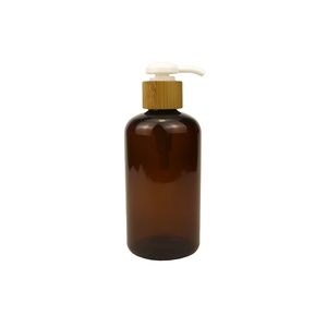 Empty 250ml shampoo plastic bottle with spray cap,plastic bottle for shampoo bioplastic bottle with bamboo ring sprayer hot sell