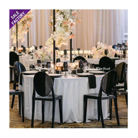 Chaise de salle à manger empilable de haute qualité pour banquet d'hôtel chaises fantômes noires acryliques en plastique à dos ovale