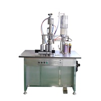 Machine de remplissage et de sertissage de gaz de bidon de peinture en aérosol semi-automatique à vendre