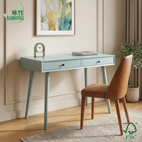 Bureau d'écriture moderne en bois écologique bleu mat avec deux tiroirs de rangement et pieds coniques pour chambre et bureau à domicile