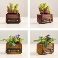 Nouveauté 2026 : Articles décoratifs créatifs et rétro en forme de radio pour pots de fleurs, objets artisanaux en résine multifonctionnels et personnalisés pour la maison