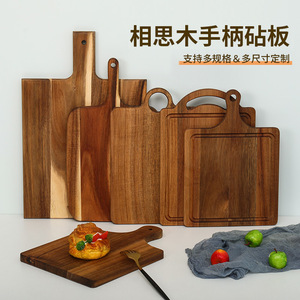 Tabla de cortar de madera de acacia con mango de madera maciza, rectangular, para uso en la cocina. - Product Image 1