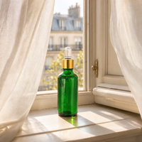 Flacon compte-gouttes en verre vert personnalisé de 30 ml, 50 ml, 100 ml pour huile essentielle liquide, avec emballage en boîte
