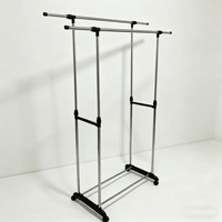 Porte-vêtements métallique robuste à double barre réglable, séchoir à linge sur roulettes, support de lavage télescopique, design moderne et minimaliste