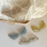 CHUJIAN Vente en gros de pinces à cheveux de luxe en acétate avec strass en forme d'ailes, barrettes latérales en cristal, petites pinces à bec de canard antidérapantes pour filles