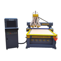 Machine de fraisage CNC à 3 axes multi-têtes avec changement d'outil automatique pour la sculpture en relief sur portes en bois et le traitement de meubles en panneaux