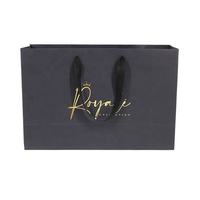 Sacs en papier d'emballage de luxe pour cadeaux, sacs de shopping en carton avec logo personnalisé, sacs de vêtements noirs pour la vente au détail, avec poignée en ruban