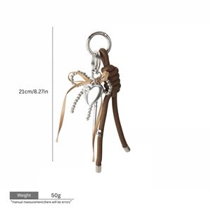 2025 Tùy Chỉnh Sản Phẩm Mới Dễ Thương Hợp Thời Trang Bạc <span class=keywords><strong>Key</strong></span> Và Bead Bow Keychain Với Dây Màu Nâu Tua Sợi Dây Thừng Túi Quyến Rũ Cho Phụ Nữ - Product Image 6