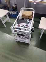 Chariot à deux niveaux robuste pour pièces de vêtements coupées |   Chariot de transport de tissus avec rail