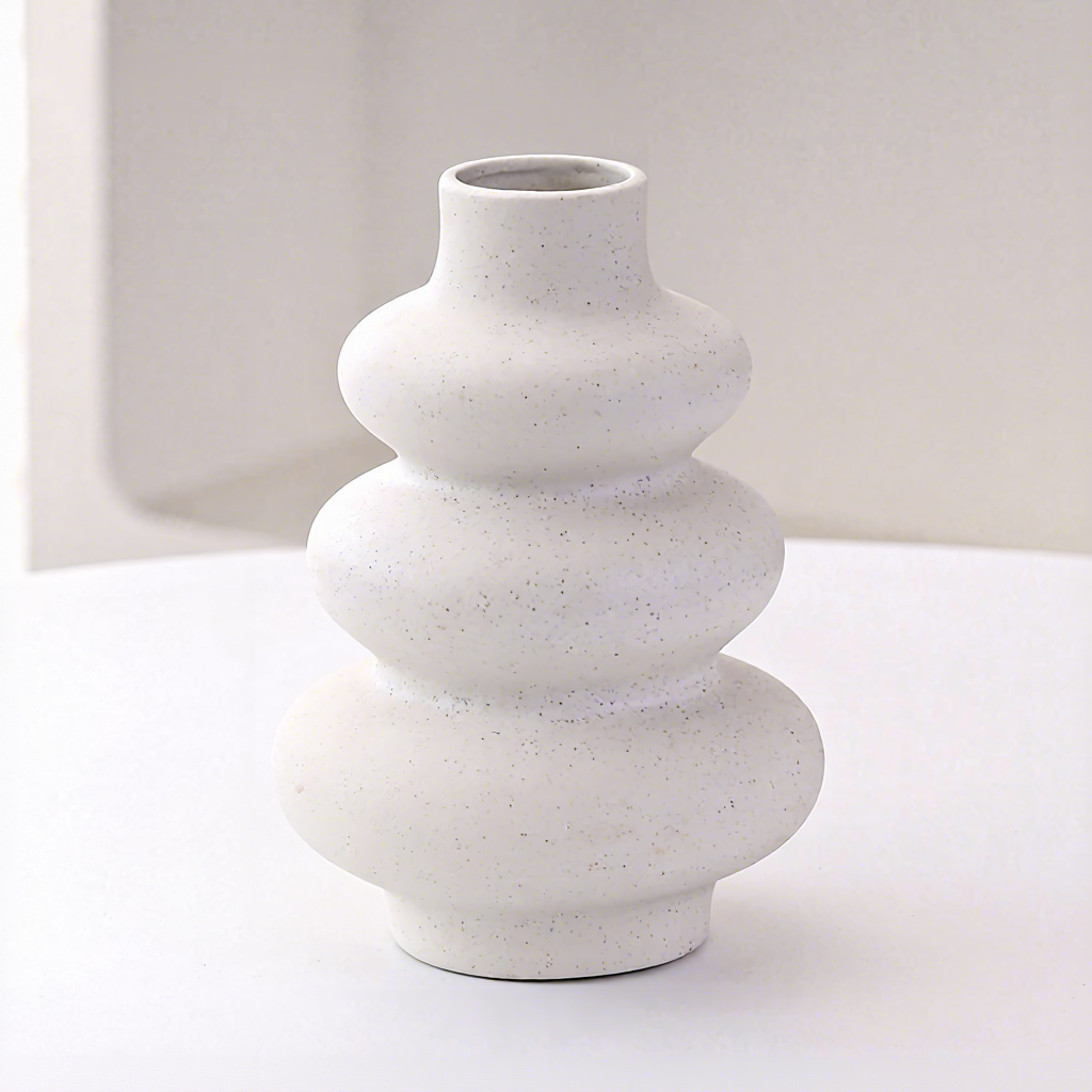 Calabaza de tres capas blanca con manchas negras.