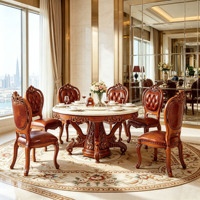 Ensemble de salle à manger rond en bois massif sculpté à la main de style européen de luxe avec plateau en marbre naturel et chaises en cuir PU pour villa, hôtel, vente en gros