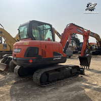 Vente Flash : Excavatrice sur chenilles Doosan DX60 d'occasion, 6 tonnes, système hydraulique complet, bon état, livraison rapide, expédition mondiale