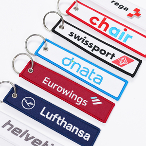 Chất Lượng Cao Hàng Không Dệt Thẻ Nhãn Phi Hành Đoàn Tùy Chỉnh Dệt Thêu Móc Khó<span class=keywords><strong>a</strong></span> Chuyến Bay Thương Hiệu Máy Bay Phản Lực Tag Thêu Keychain Trong Số Lượng Lớn - Product Image 1