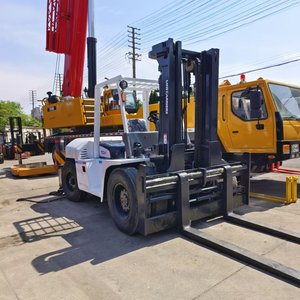 Carretilla elevadora <span class=keywords><strong>TCM</strong></span> FD100 de <span class=keywords><strong>10</strong></span> toneladas, producción de 2020, motor diésel ISUZU, construcción resistente, operación confiable, AWD, neumático sólido usado - Product Image 1