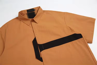 Chemises de travail pour hommes à col montant, manches courtes, coupe ample, boutonnées, style décontracté, motif uni brodé, tissu tricoté