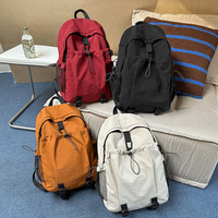 Sac à dos décontracté imperméable en nylon, grande capacité, portable, pour l'école, couleur unie, avec bretelles à coussin d'air, unisexe