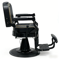 Fauteuil de Barbier Rétro Noir avec Finition Dorée, Hydraulique, Inclinable, en Cuir, Appuie-tête et Repose-pieds Ajustables, Vente en Gros pour Salons de Coiffure