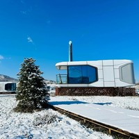 Capsule spatiale préfabriquée mobile moderne pour l'extérieur, maison mobile, hôtel de villégiature, mini-cabane préfabriquée intelligente
