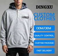 Sweat-shirt en coton molletonné gris chiné pour homme avec logo personnalisé, doublure à carreaux, col Henley à boutons-pression et poche kangourou