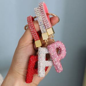 Porte-clés de voiture et pendentif de sac pour femme en céramique avec lettres anglaises et strass, vente en gros d'usine, cadeau jouet très populaire - Product Image 5