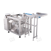 Machine automatique de remplissage, scellage et emballage de sachets verticaux préformés pour cacao, épices, kimchi et cornichons