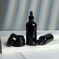 Bouchon à vis rond en verre de luxe en gros flacon compte-gouttes d'huile essentielle de sérum de parfum avec compte-gouttes noir