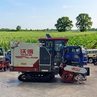 Moissonneuse-batteuse multifonctionnelle WORLD d'occasion en bon état, machine de récolte de riz sur chenilles d'occasion, économe en énergie