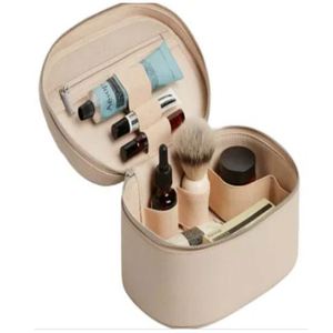 Elegant Oval Handheld Cosmetic Bag Custom Logo PU Leather Travel <b>Makeup</b> Storage <b>Case</b> Wash Bag - Product Image 3