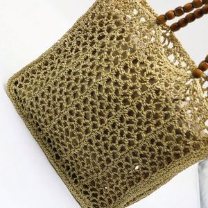 Bolso de playa de malla de ganchillo hueco para mujer, novedad de verano 2025, con asa de cuentas de madera - Product Image 4