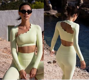 ชุดออกกำลังกายลายคลื่นแบบสแกลลอป แขนยาว เสื้อครอปเปิดหลังแบบอสมมาตร กางเกงเอวสูง สำหรับผู้หญิง เหมาะสำหรับฟิตเนสและโยคะ - Product Image 5