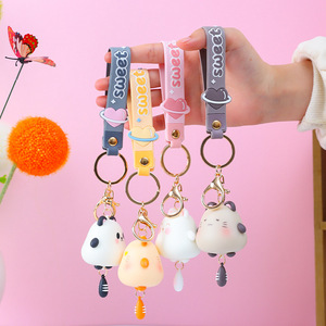 Nuovi simpatici oggetti decorativi doppi, trendy e creativi, portachiavi dorato a forma di cartone animato, ciondolo per borsa, vendita all'ingrosso. - Product Image 1