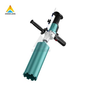 Taladro de diamante portátil con mango auxiliar para un mejor control - Product Image 1