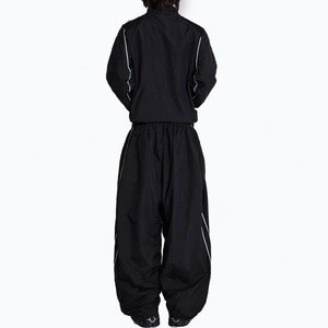 Pantalon en polyester avec passepoil pour homme, couleur unie, OEM, pantalon de sport streetwear pour homme, taille élastique, coupe ample décontractée, pantalon de jogging baggy - Product Image 5