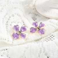 Anting-anting kancing semanggi tetesan minyak baja tahan karat ungu mulus baru anting-anting telinga motif bunga manis canggih mewah ringan