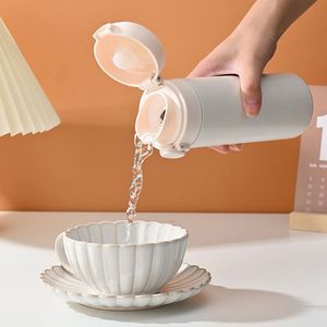 Botella de Agua Aislada al Vacío de 450 ml con Logotipo Personalizado de Alta Calidad, Tapa con Boquilla Extraíble, a Prueba de Fugas, Botellas de Agua Elegantes para Mujeres y Niños - Product Image 2