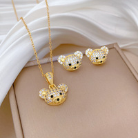 Ensemble de bijoux en acier inoxydable plaqué or 18 carats PVD avec pendentif et boucles d'oreilles en forme d'ours, idéal pour mariage et cadeau de fête