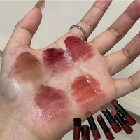 Rouge à lèvres solide effet miroir aqueux, brillance satinée rouge verre, longue tenue, pigmenté