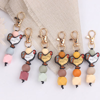 Jouet de dentition créatif DIY en forme de coq de dessin animé, fait main en silicone perlé, pendentif de sac et porte-clés, emballé individuellement pour clés de voiture et sacs