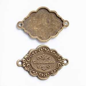 ملصق خياطة مخصص ثلاثي الأبعاد من سبائك الزنك، علامة معدنية منقوشة يدويًا مع شعار للحقائب والمحافظ وحقائب الظهر - Product Image 6