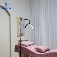 Table de massage pliable moderne en métal de luxe haut de gamme MOOLIN, avec éponge haute densité, pour salon et usage commercial