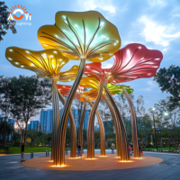Sculpture géante personnalisée en métal en forme de feuille de lotus, lumineuse et durable, pour l'aménagement paysager extérieur de Noël, idéale pour les places municipales et les sites touristiques.