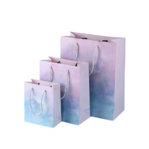 Vente en gros d'usine Guangzhou Sacs-cadeaux de luxe Sac en papier pour achats quotidiens avec logo pour vêtements Sacs d'emballage personnalisé - Product Image 6