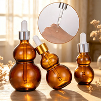 Bouteilles compte-gouttes en verre ambré en forme de gourde, résistantes à la lumière, pour le stockage d'huiles essentielles et l'utilisation cosmétique