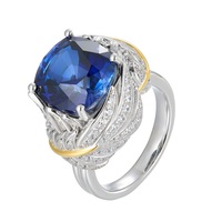 Bague en argent 925 plaqué blanc avec saphir synthétique et plume, collection Banquet Haute Couture Manor Lady Royal Family, modèle Standing