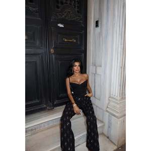 Pantalon taille haute en tissu de coton noir avec détails en pierre - Product Image 1